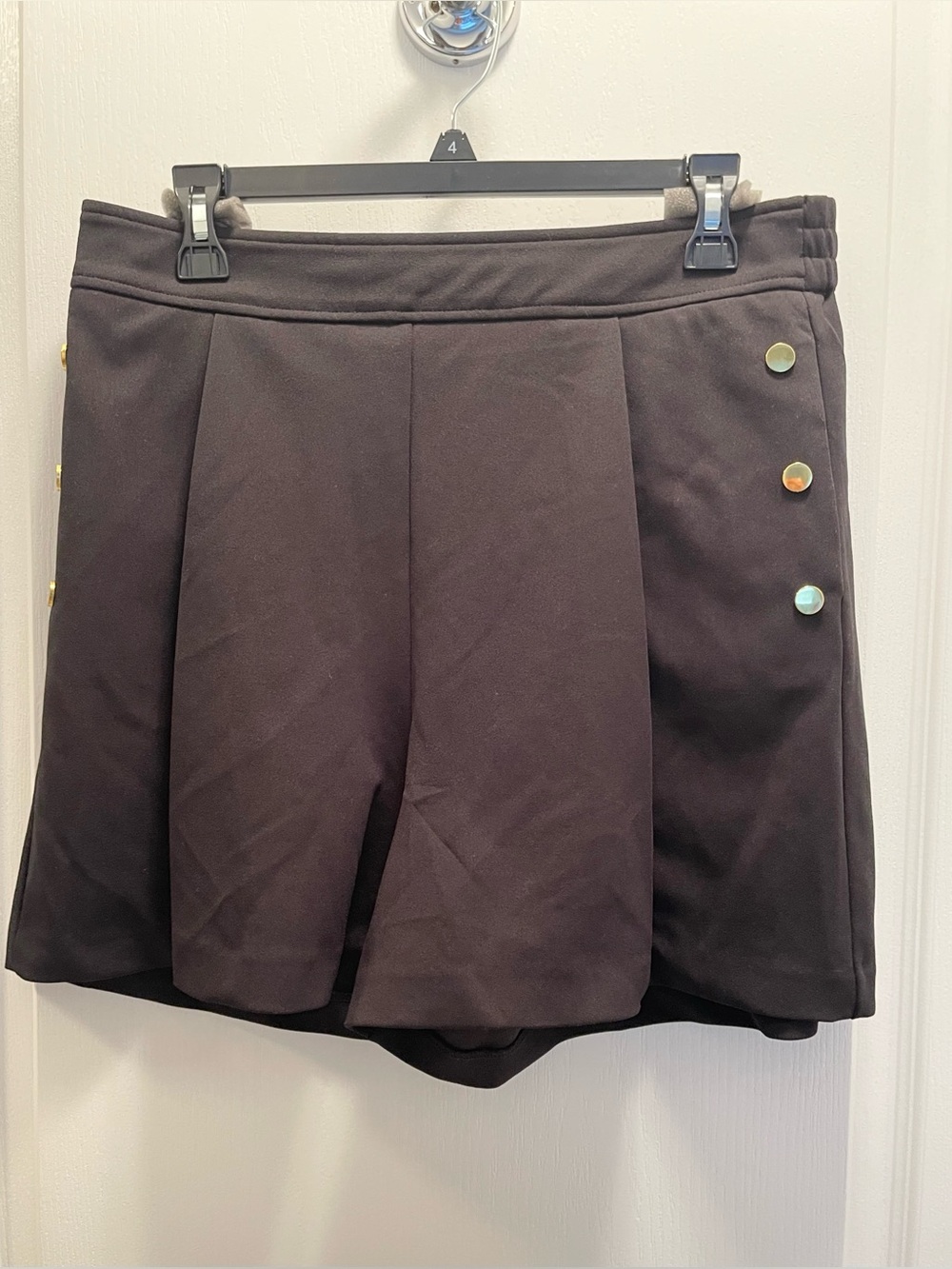 Women’s Black Pleated Shorts with Decorative Gold Buttons